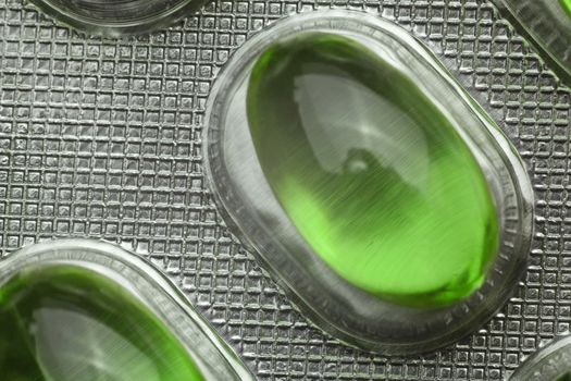 Silver Pills On Metal Table Background, copy space
