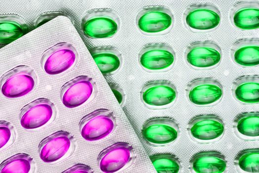Green And Pink Pills in blister, copy space