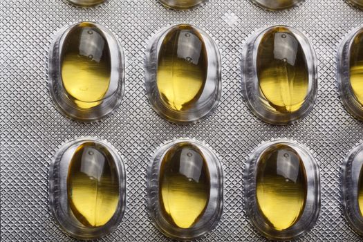 Silver Pills On Metal Table Background, copy space