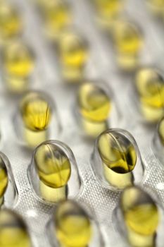 Fish Oil Pills On Metal Table Background, copy space