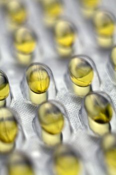 Fish Oil Pills On Metal Table Background, copy space