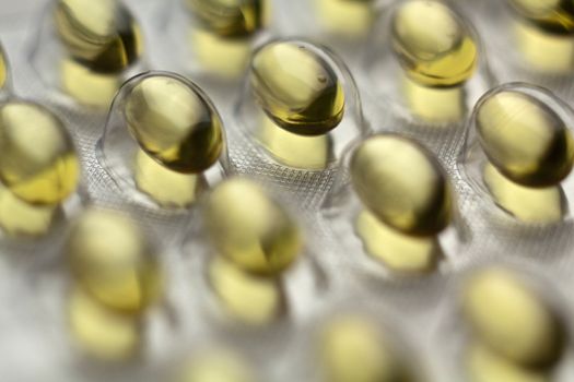 Silver Pills On Metal Table Background, copy space
