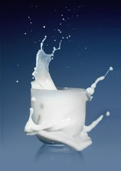 splash of milk glass on a blue background