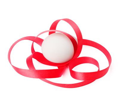 egg with red ribbon