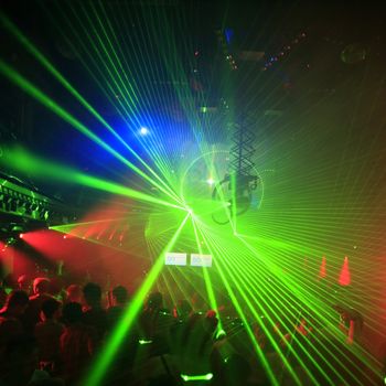 Lolored laser party in entertainment disco club