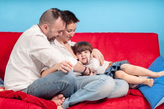 happy family on the couch in the living room