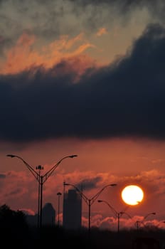 dramatic sunrise over city