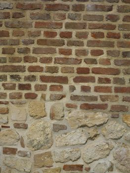 Wall of bricks and rocks, wide and detail