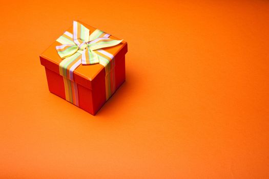 Concept and ideas: Gift Box On Orange Background