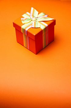 Concept and ideas: Gift Box On Orange Background