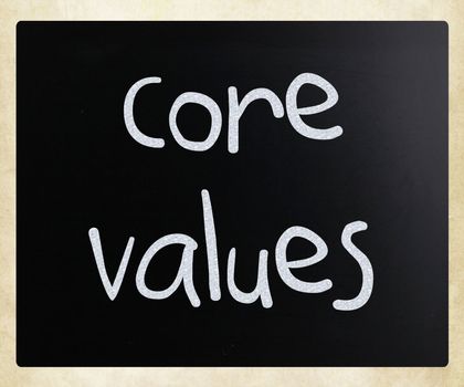 Ethics concept - core values handwritten with white chalk on a blackboard