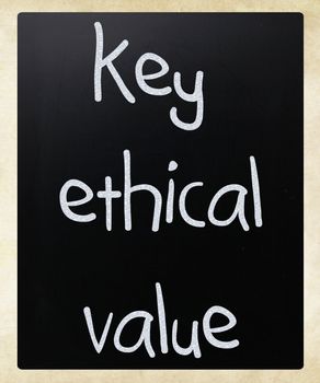 "key ethical value" handwritten with white chalk on a blackboard