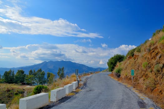 view from the mountain road leading over the city mijas