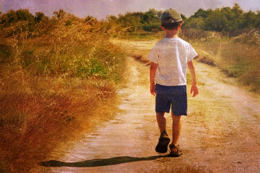 Vintage picture of a young child walking on a road