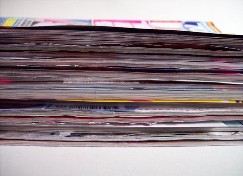 Close up photo of a pile of magazines