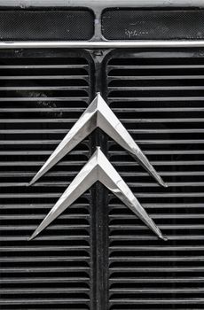 Chevrons on grille of vintage vehicle