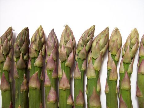 close-up photo of asparagus on a white background