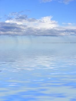 Illustration of clouds sucking up water from the ocean