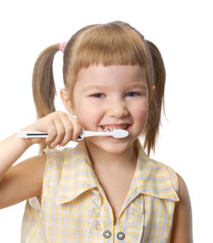 Girl with toothbrush  isolated on a white background. 