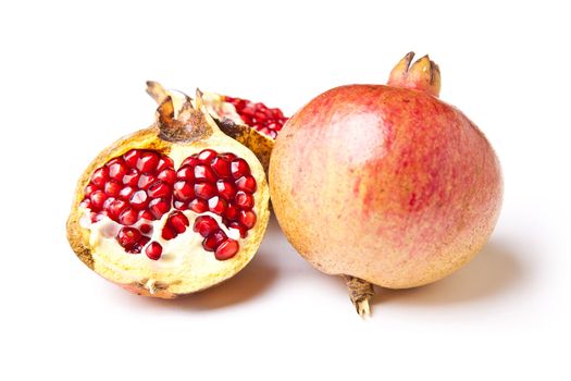 Pomegranate on white background, fruit - organic food