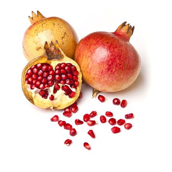 Group of pomegranate with seeds on white background, fruit - organic food
