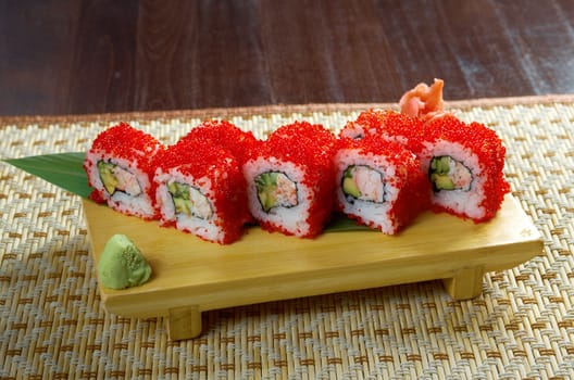 Japanese sushi  traditional japanese food.Roll made of Smoked fish and red roe