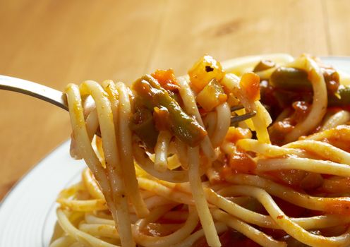  pasta with tomato  sauce  on wooden table