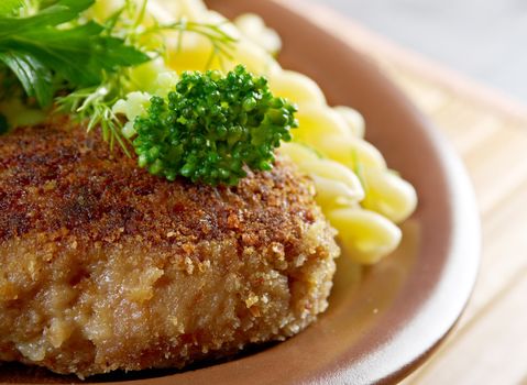 delicious macaroni pasta  with beef cutlets,vegetableon