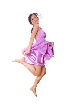 Woman In Violet Silk Dress Jumping, isolated on white