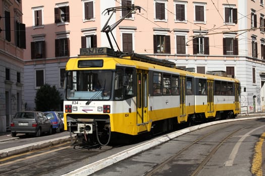 ROME - MAY 12: Yellow tram on May 12, 2010 in Rome, Italy. The tram (officially railway) is operated by Rome Metro, which has an annual ridership of 331 million passengers (2008, 32nd worldwide).