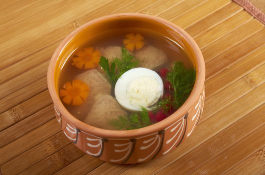 Aspic from meat decorated with egg, carrot,