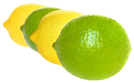 Fresh limes and lemons on a white background.