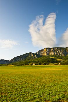 Farmhouse Surrounded by Fields in the French Alps