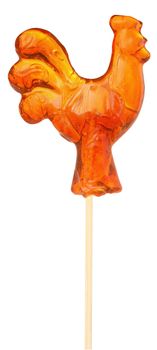Lollipop in the form of rooster isolated on white background.