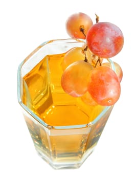 Grapes and glass of juice of a grapes.
