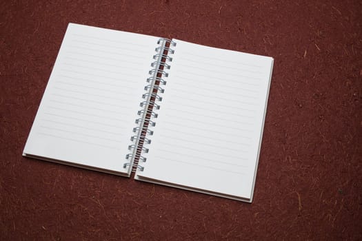 Clear page on notepad ready for writing, pencil, background