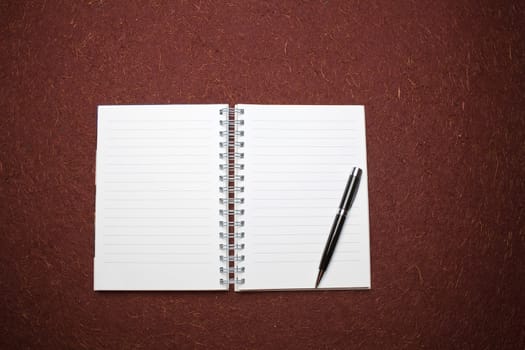 Clear page on diary ready for writing, pencil, background