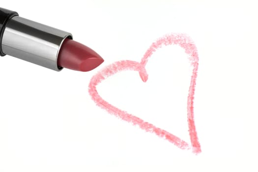 Lipstick and heart on paper