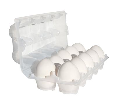 Plastic box with eggs on a white background.