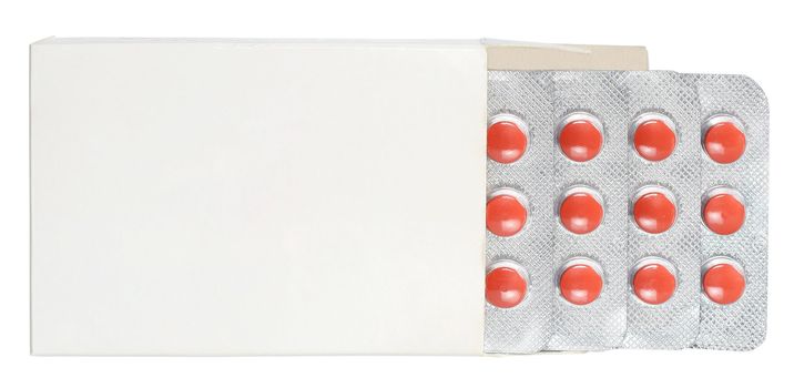 Pills in a box on a white background.