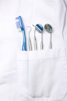 White Dentist Pocket With Toothbrush And Angled Mirror