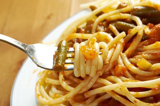  pasta with tomato  sauce  on wooden table