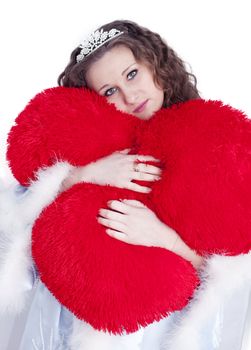 Girl hugs heart on a white background