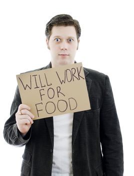 Unemployed businessman with a sign WILL WORK FOR FOOD. Isolated on white.