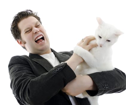 Man fighting with white cat. Isolated on white.