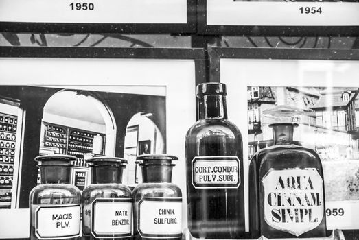 Pharmacy bottles in the window