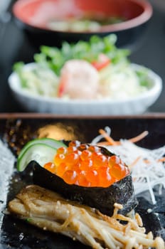 Salmon roe sushi  with cucumber  and fried golden needle mushroom
