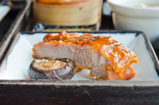 Chinese spare ribs with mushroom on plate