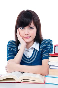 Portrait of an attractive female student with her hand on chin over white background.