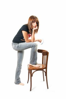 The girl with a chair on a white background 